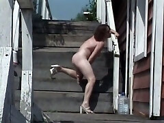 Really wild sex addict uses a dildo to pet her moist pussy right outdoors