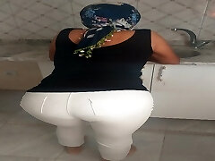 Turkish dame in white tights, thin stockings, hijab