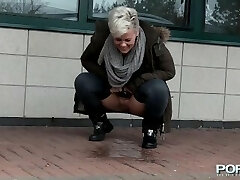 Chesty mature Bree peeing in the public