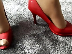 wife modelling in red peep toe heels of another doll