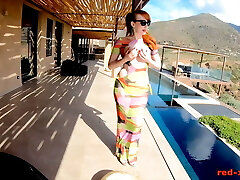 Redhead MILF Red Gonzo masturbating outside by the pool 
