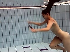 Sexy underwater teenage swimming