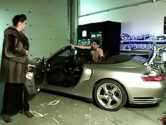 Busty dark haired chick pays for a car repair with her crevices