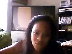 Sultry black webcam babe shakes her big round booty in panties