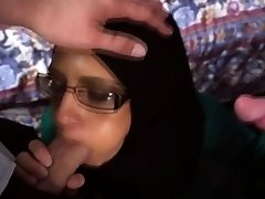 Arab babe in glasses inhales that big hard trouser snake