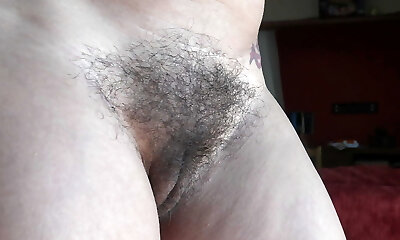 a mature french milf shows her 55year old hairy vagina