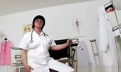 Brunette practical nurse examining her cunt