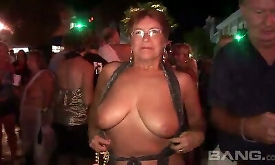 These mature women love to flash in public and they've got big natural tits