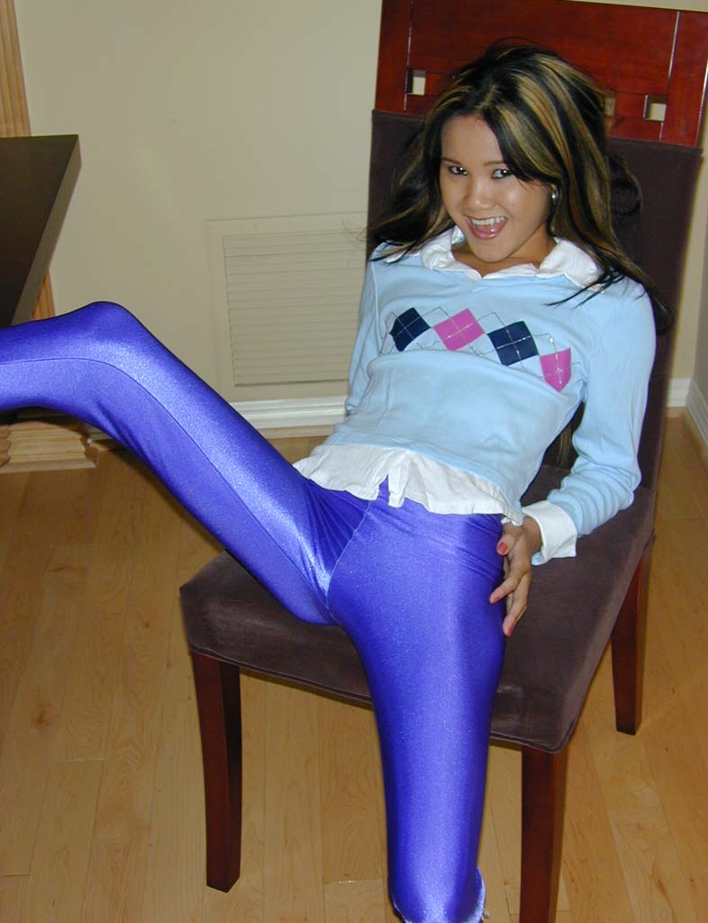 Girls In Spandex - This hot little Asian girl brings spandex back with a bang.