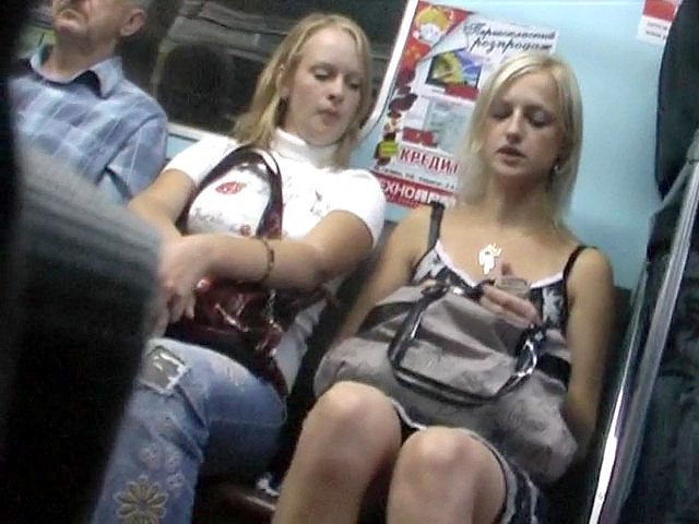 Peachy blond upskirt in subway
