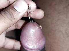 Inserting safety pin inside penis. Jerking cock with inserting needle inside. Hurting penis
