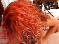 A redhead slut from France adores a massive cock from behind