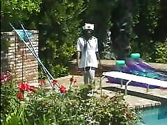 Nurse in white stockings seduces black dude sunbathing by the pool to fuck her