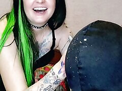 Smoking fetish. Dominatrix shakes cigarette ash on her slave&039;s head and mouth.