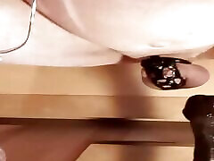 Dildo riding in cage on a mirror and nipple stretching