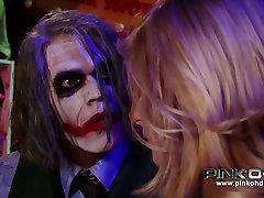 Perverted Joker makes submissive latex beauty suck his strong cock