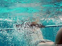 Busty teen Piyavka Chehova swimming in a skandal ldii like a mermaid