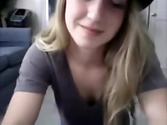Cute blonde girl shows off her naked body on cam and fingers her pussy