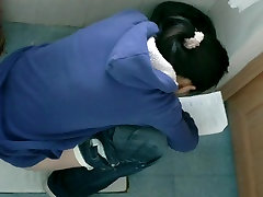 Bathroom spy cam mms dawnlod of Asian girl reading while pissing