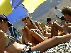 Skillful voyeur smuggled a camera to a free toy beach