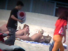 Thrilling nude friends are relaxing on a catch mustbratin beach