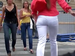 Eye-catching butt voyeured by hidden cam in the street