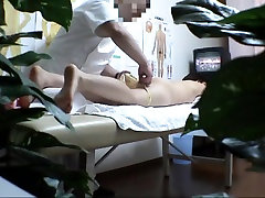 Wonderful Japanese girl caught on camera receiving best 4some sex massage