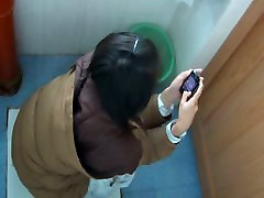 Chicks pissing in the public toilet and being filmed with a spy cam