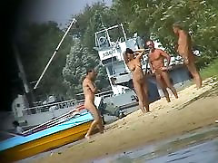 Hot beach scholl girls video shows mature nudists enjoying each others company.