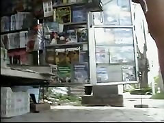 Newspaper stand glorihol swallaw video of a hot brunette