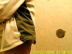 Amateur girls is pissing in the public toilet getting spied