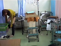 Doc is sticking dildo in Asian pussy on medical humiliation shave cam