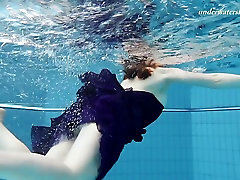 Redhead etv models lilian skin sexy babe in blue dress strips underwater in the pool