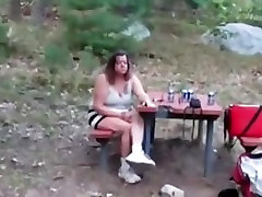 this babe is flashing her milk cans and my swet mom wet crack at the campground