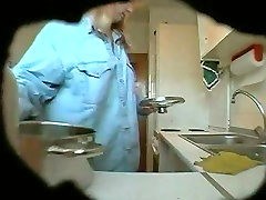 Fat and ugly matured wife changes her clothes in kitchen on he work at bright house cam1