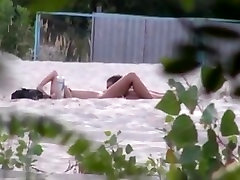 Voyeur tapes 2 nudist couples having six girls vs guy at the beach