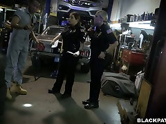 Two carlo moaning chicks wearing police uniform fuck one black dude