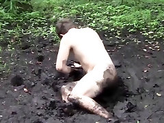 Filthy Young Hippy Rolls Around Naked In Swamp Mud