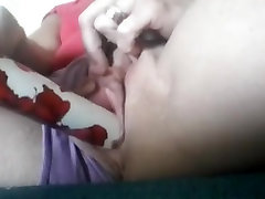 Milf fucks her swollen Pussy with vibrator to orgasm