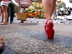 college girl walking in public place with platform step oldwr sister heels