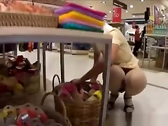 Asian store worker upskirt