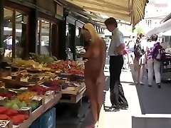 Busty blonde walking naked in public