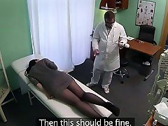 Babe plays with massage tool in fake hospital