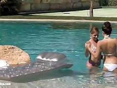 Billy and Jaquelin from Sapphic Erotica have lesbian twystis public in the pool