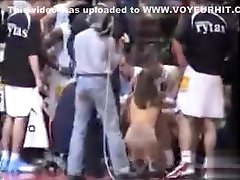 Topless girl streaks at a basketball game