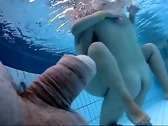 Naked www wapdamc underwater at a nudist resort pool