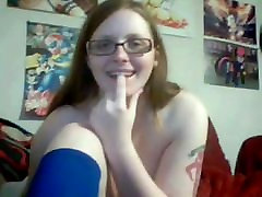 Busty Redhead Teen With Glasses