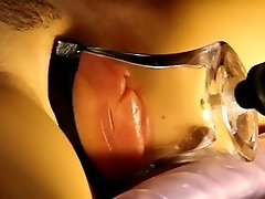 pumped bbw fiona lips in a tight, flat glass tube