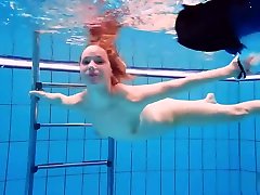 Redhead babe swimming xxx tube anal com in the pool