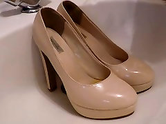 pissing all over beige patent heels